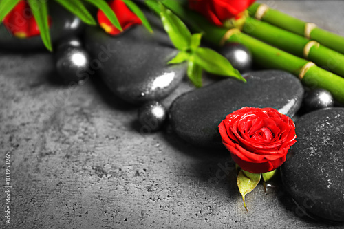 Photography Beautiful spa composition with roses, bamboo and stones