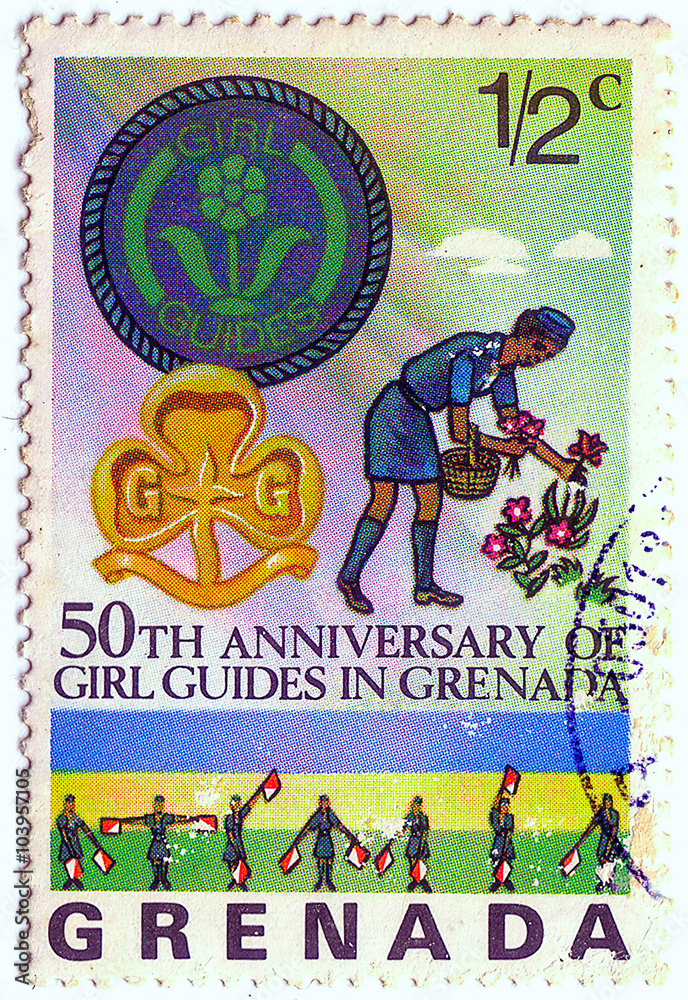 GRENADA - CIRCA 1976: a postage stamp printed in Grenada showing an image of Girl Guides, series 50 anniversary of the guides, circa 1976