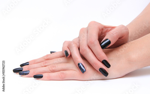 woman hands with black nails. Manicure