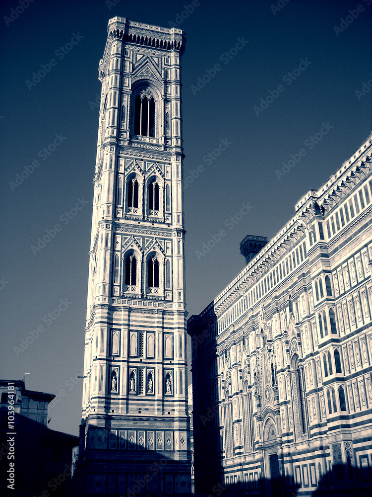 Renaissance exterior of Florence cathedral, Italy, in black and white. Monochrome image filtered in retro, vintage style with extremely soft focus and red filter, high contrast dramatic effect.