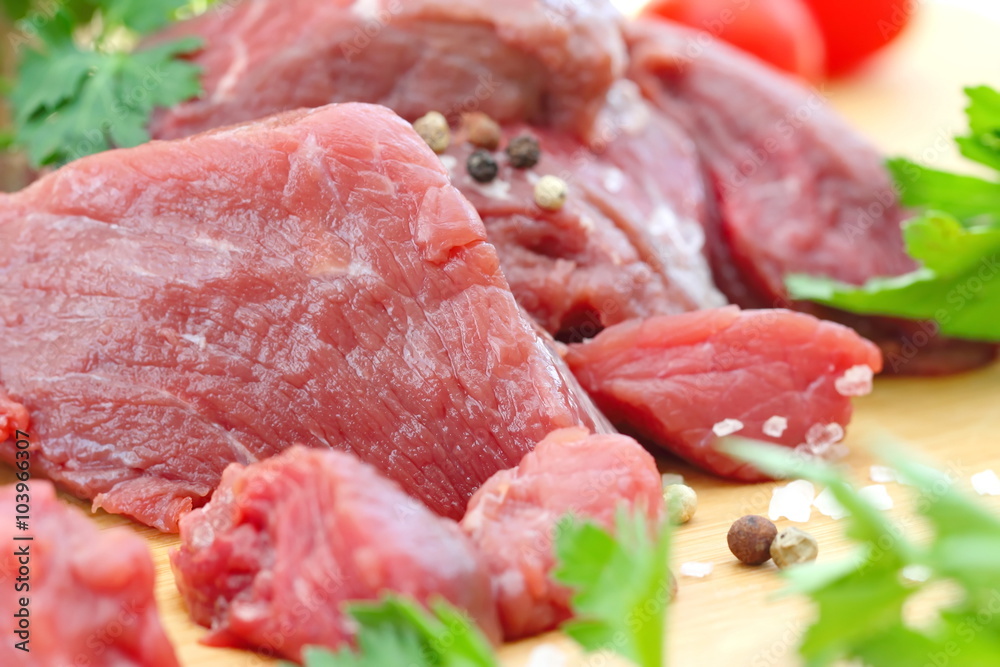Raw meat with vegetables and spices