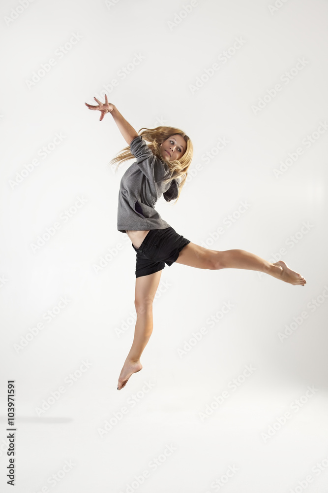 beauty girl dance on grey background