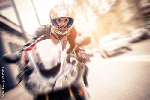 Biker driving sportive motorbike