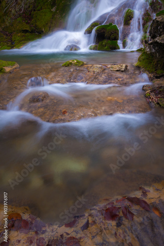 Beautiful waterfalls and mountain stream in Transylvania, in early spring