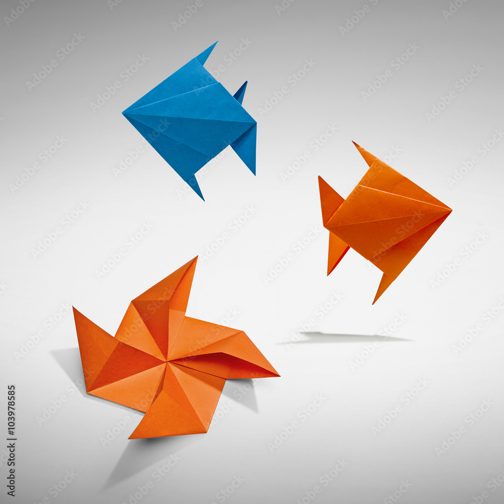 Group of swimming fishs in Origami - clipping path Group of swimming fishs in Origami - clipping path