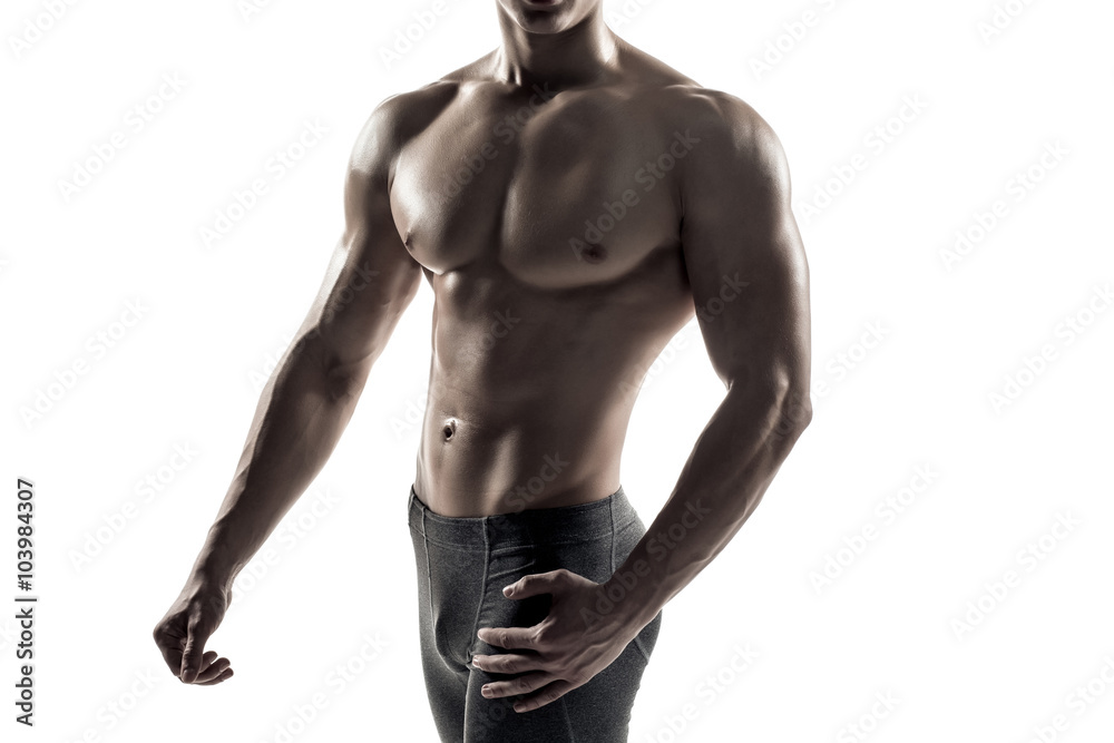Strong man showing perfect body, abs and chest. Close-up Strong man showing perfect body, abs and chest. Close-up