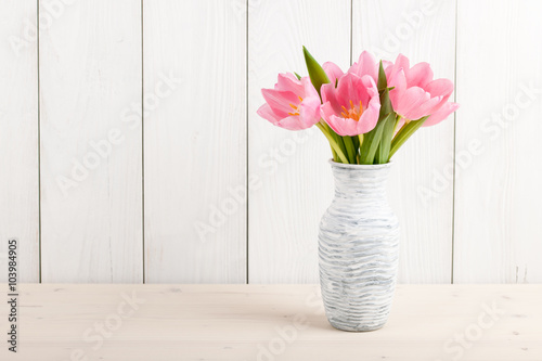 Fresh pink tulips in a jug