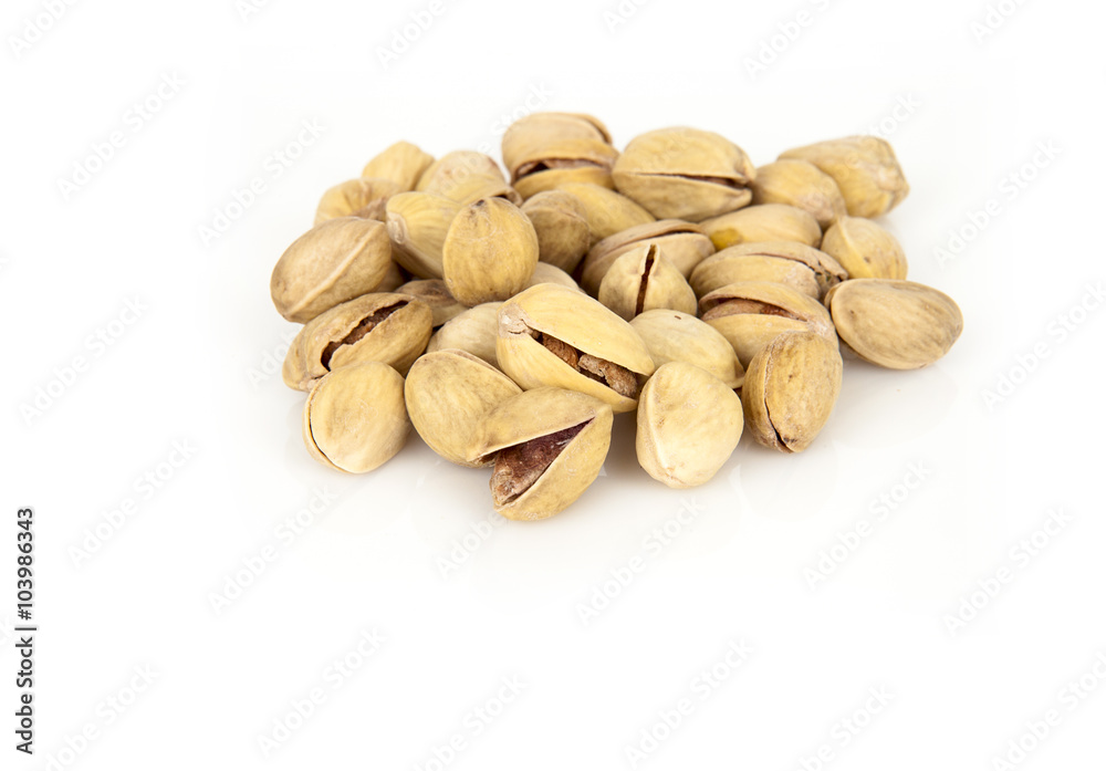 tasty pistachios heap against close up white background tasty pistachios heap against close up white background