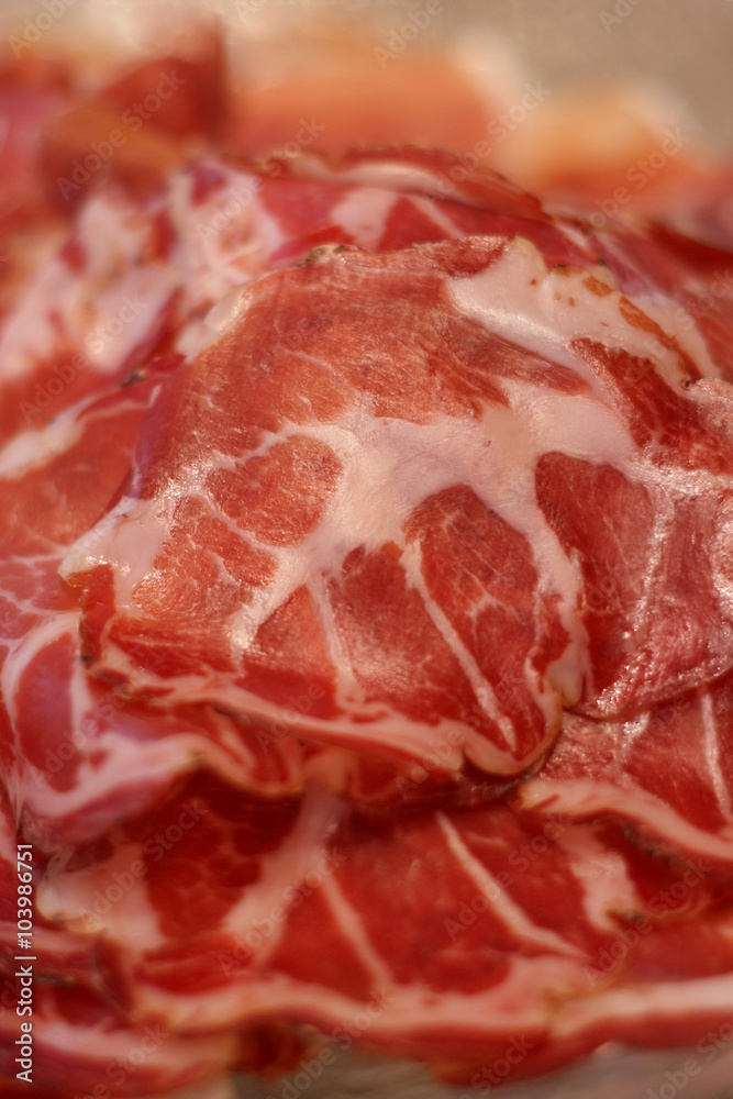 Fresh cold sliced bacon, selective focus, shallow DOF. Fresh cold sliced bacon, selective focus, shallow DOF.