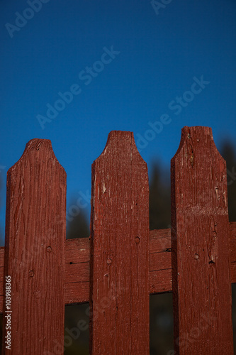 Red wooden fence