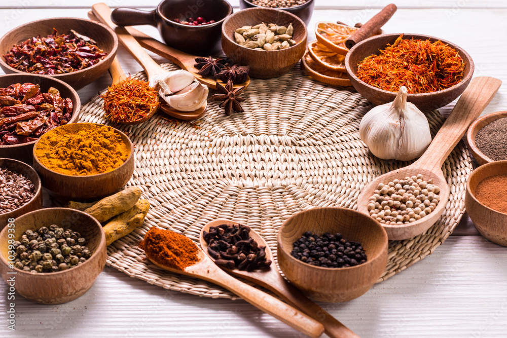 spices and herbs on wooden table. spices and herbs on wooden table.