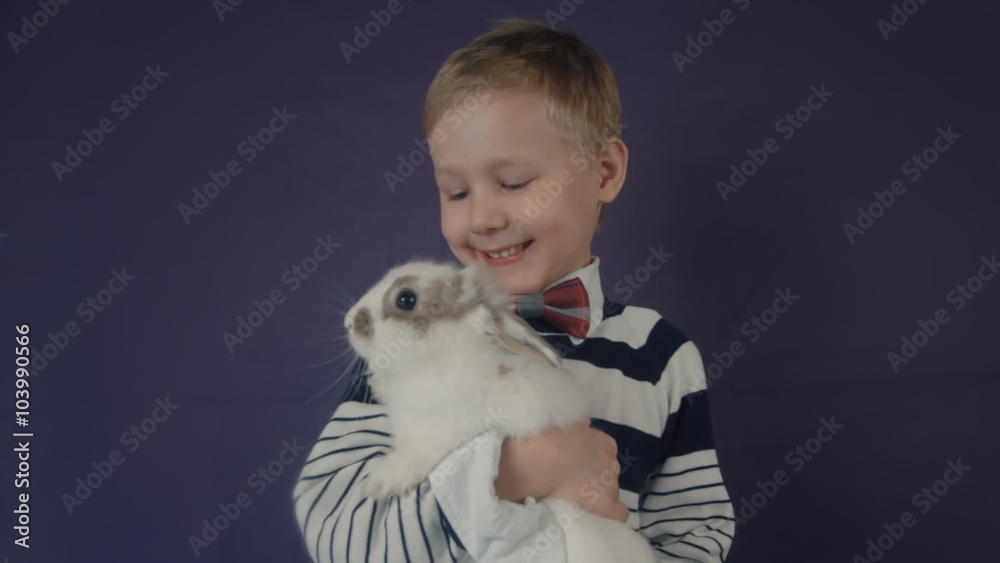 White Easter Bunny playing with a child. White Easter Bunny playing with a child.