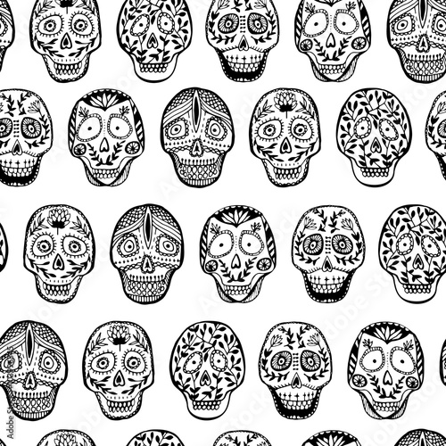 Hand drawn mexican skull seamless pattern with floral ornament.