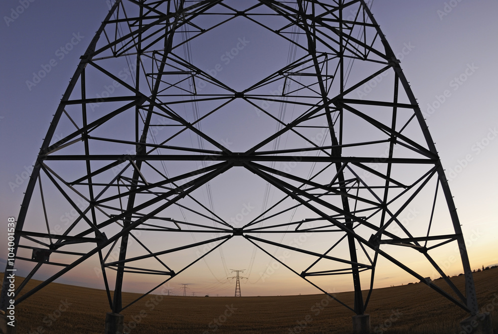 Electricity pylons at sunset, France, Europe