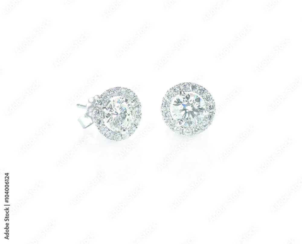 Beautiful Halo Diamond Stud earrings with reflection isolated on white Beautiful Halo Diamond Stud earrings with reflection isolated on white