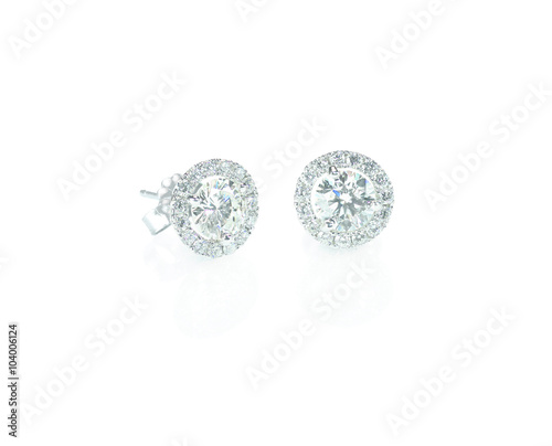 Beautiful Halo Diamond Stud earrings with reflection isolated on white