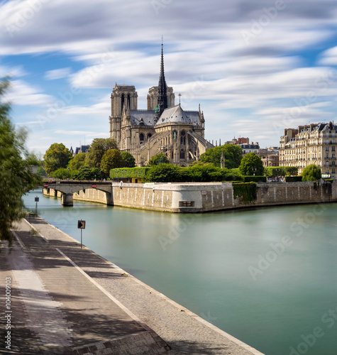 Long exposure of Notre Dame Cathedral & the Seine River on Ile de La Cite, Paris, France. The Cathedral exemplifies French Gothic architecture. 4th Arrondissement, 75004 Paris © Francois Roux