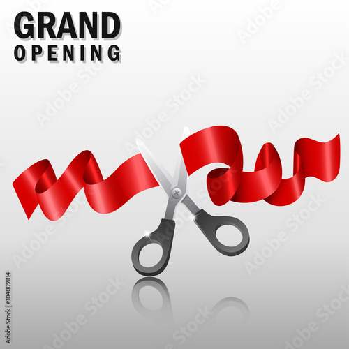 Grand opening with red ribbon and scissors