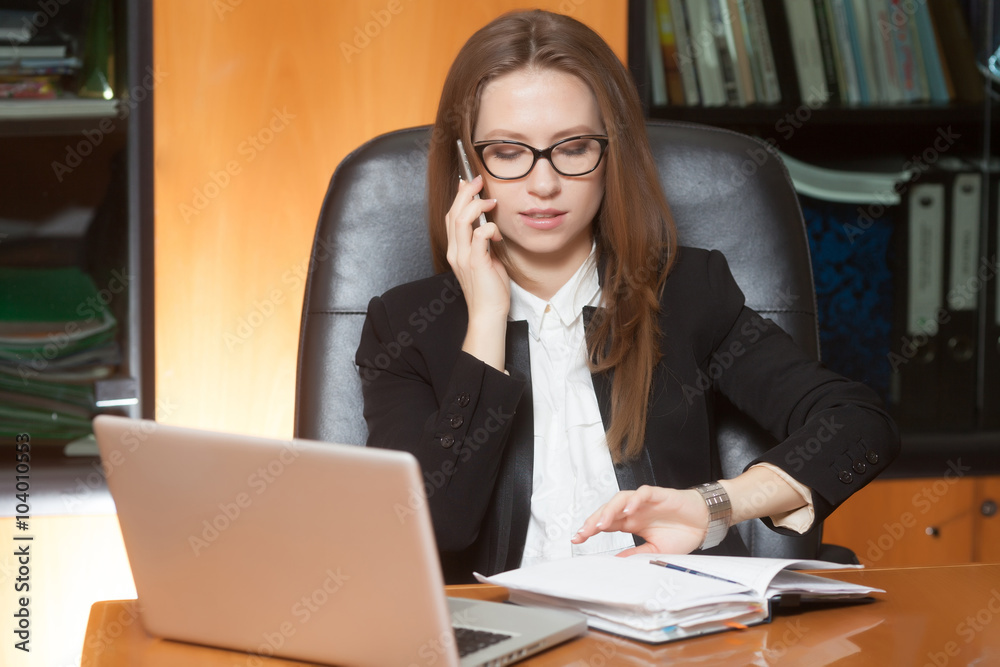 Young beautiful lady talking by phone Young beautiful lady talking by phone