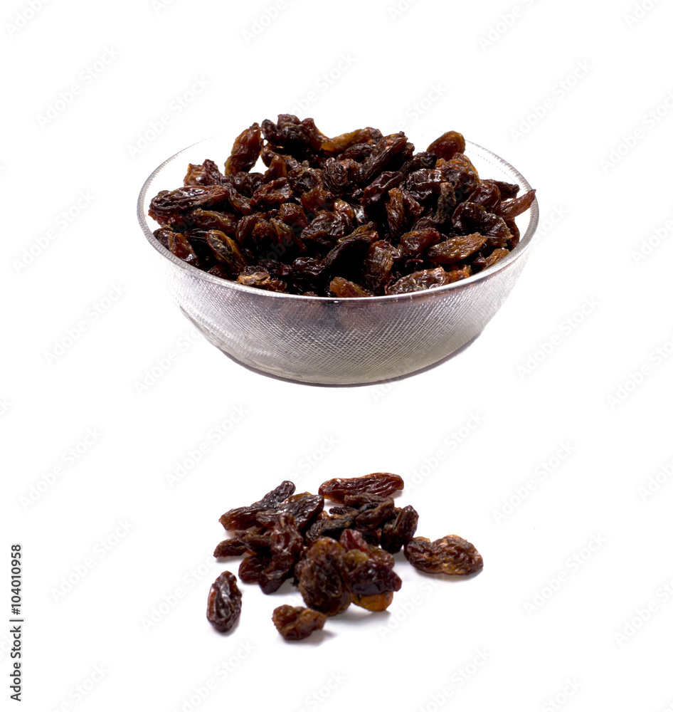Obraz premium plate with raisin and a row several grains of raisin