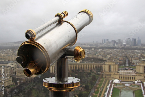 PARIS, FRANCE -16 DECEMBER 2011: Spyglass and a view from Eiffel Tower at Paris