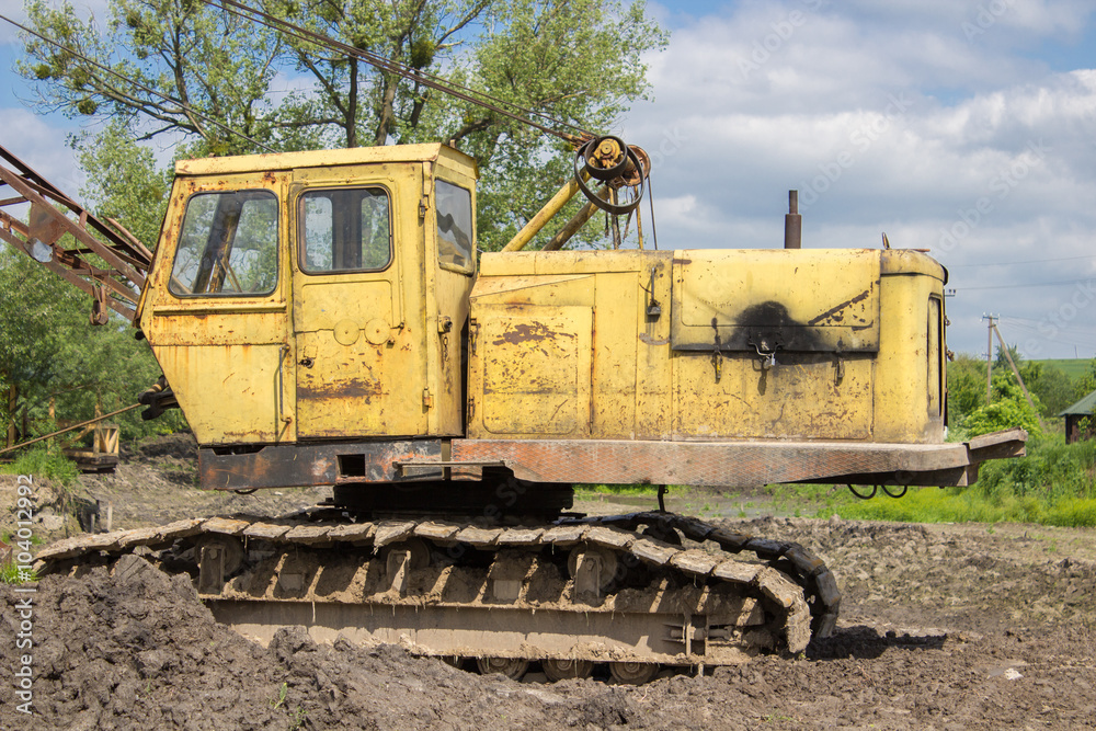 Old yellow excavator