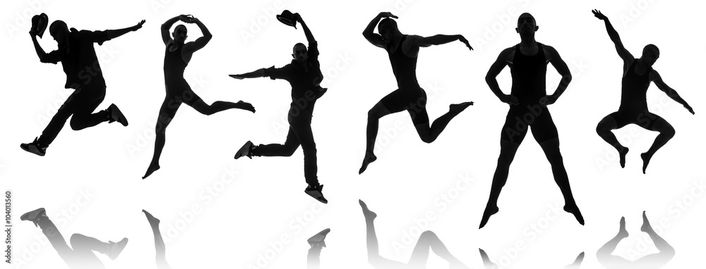 Silhouettes of dancers in dancing concept