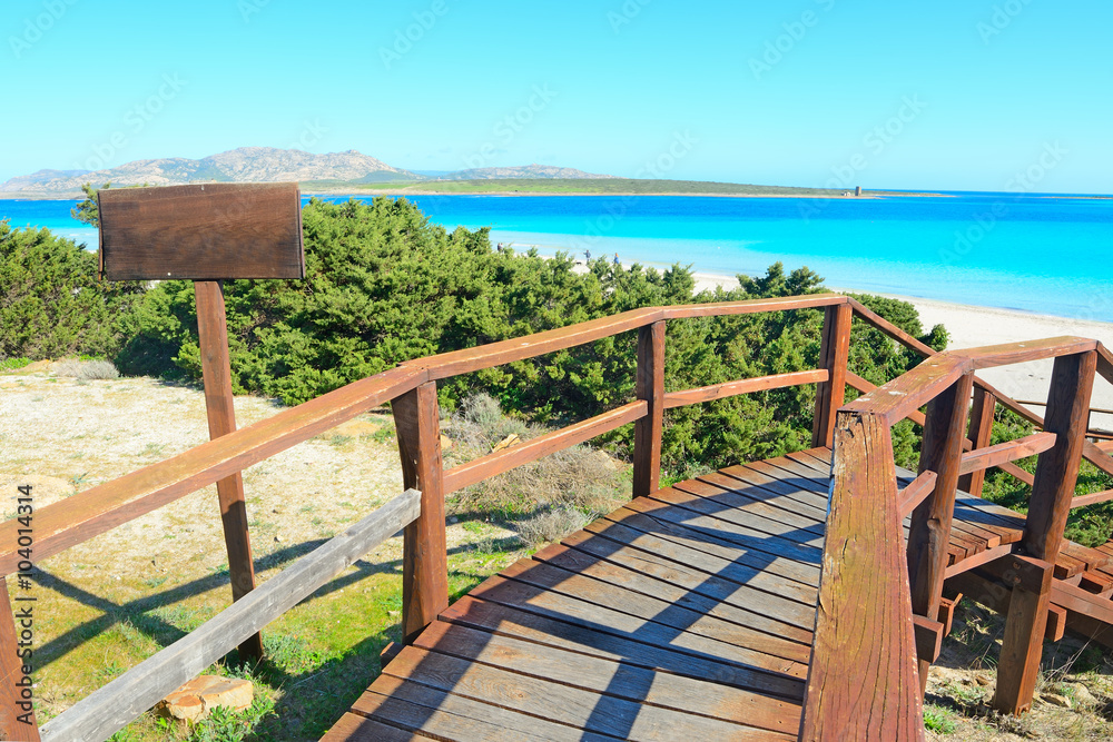 wooden stairway to the beach in Sardinia wooden stairway to the beach in Sardinia