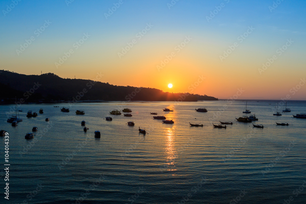 Sunrise on the sea with boat Sunrise on the sea with boat