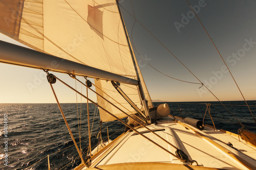 Sailing boat wide angle view in the sea at sunset © aragami