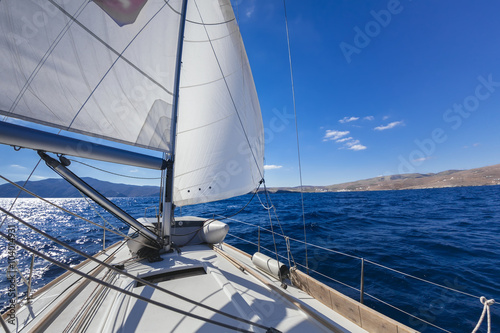 "Wing and wing" sailing on the yacht during the regatta near gre