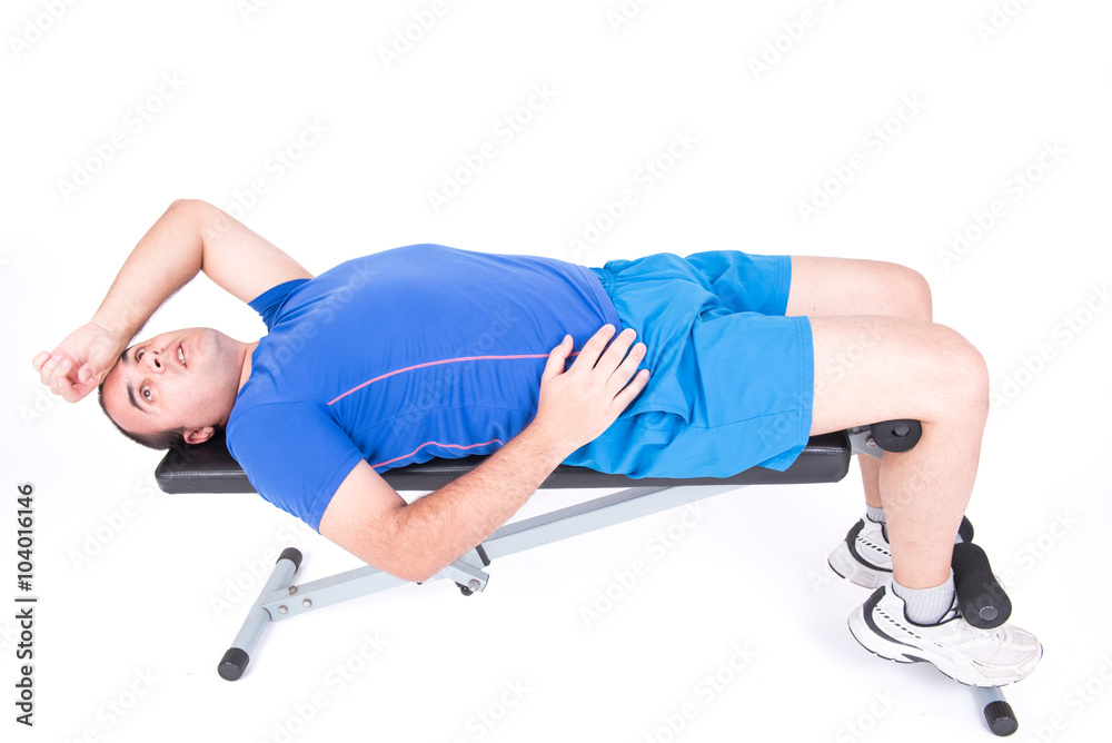 Obraz premium Man in abdominal bench