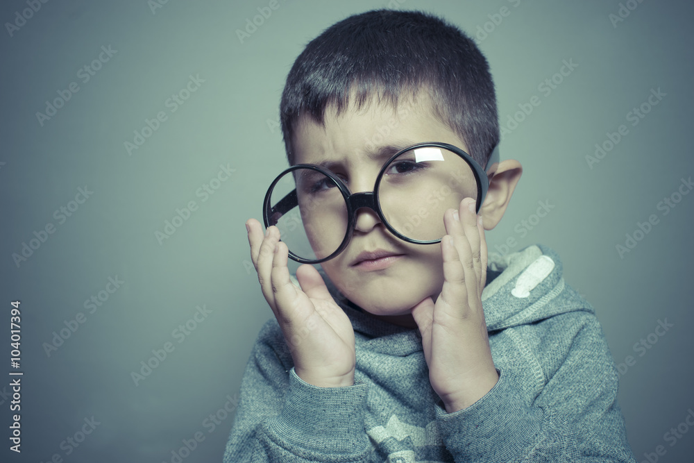 dark-haired young student with big glasses thinking gesture dark-haired young student with big glasses thinking gesture