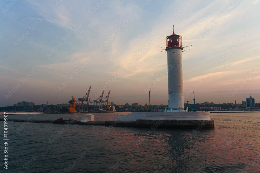 View of the lighthouse and the port at sunset. Odessa, Ukraine