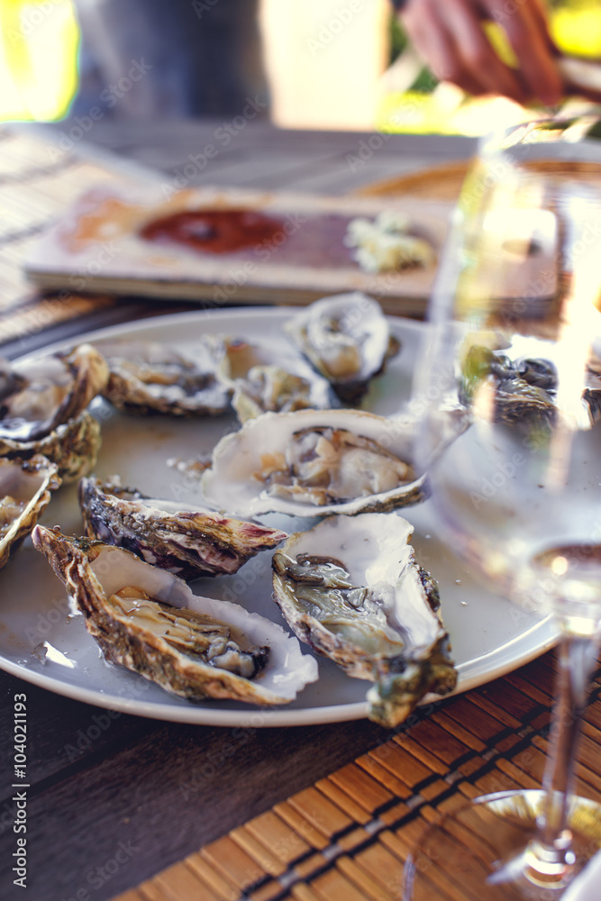 Naklejka premium Seafood and glass of wine.