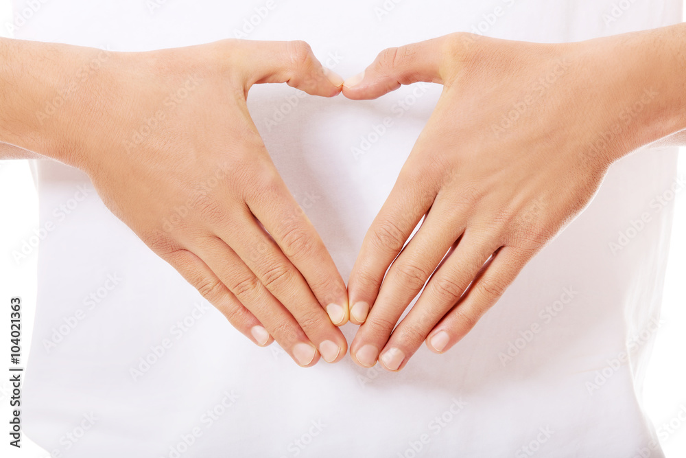 Young man doing heart gesture Young man doing heart gesture