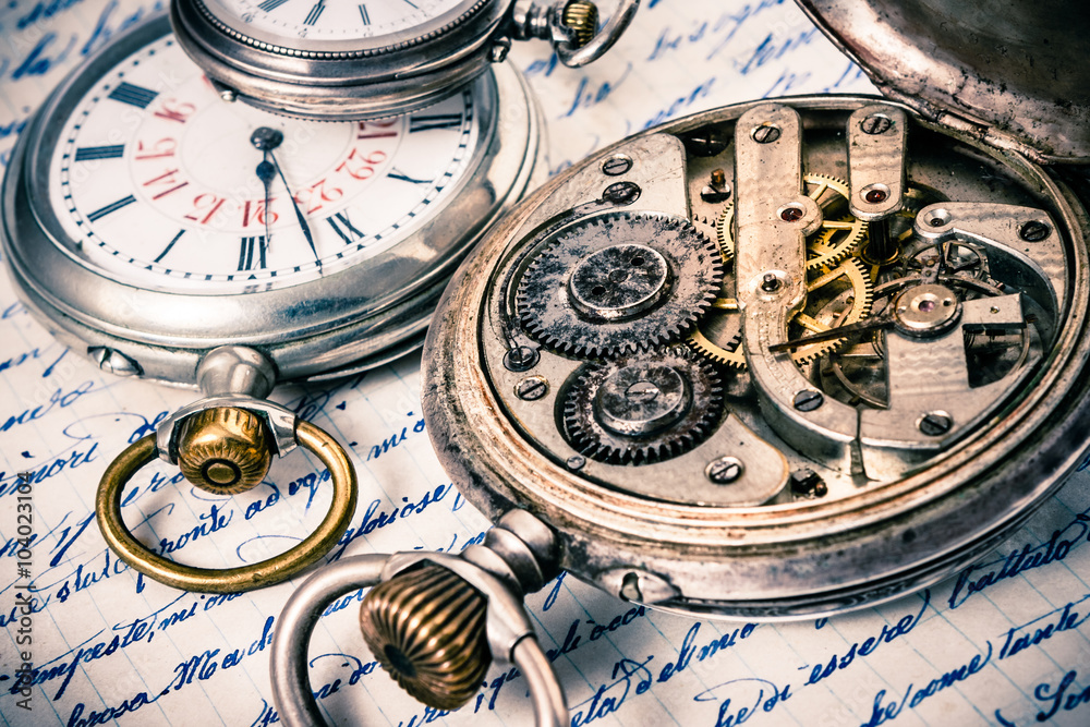 Ancient Pocket Watches on Retro Document