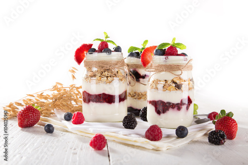 Tasty yoghurts with muesli,...