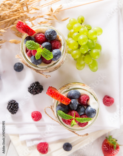 Tasty yoghurts with muesli,...