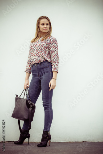 Attractive fashionable woman with bag