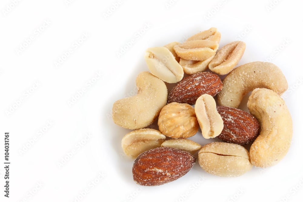 Fototapeta premium Salted Mixed Nuts on White Background