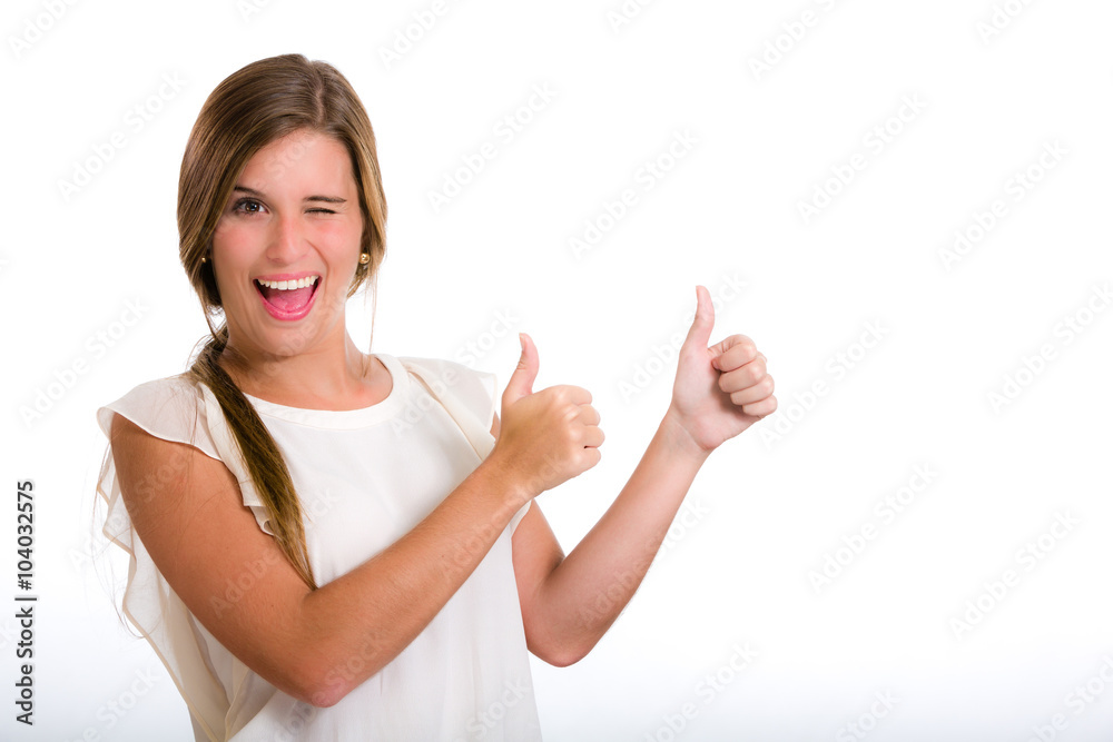 Hispanic young woman with success expression. Thumbs up. Hispanic young woman with success expression. Thumbs up.