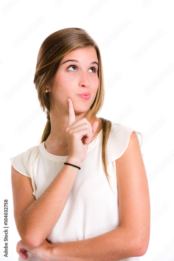 Pensive Hispanic young woman thinking of the options Pensive Hispanic young woman thinking of the options