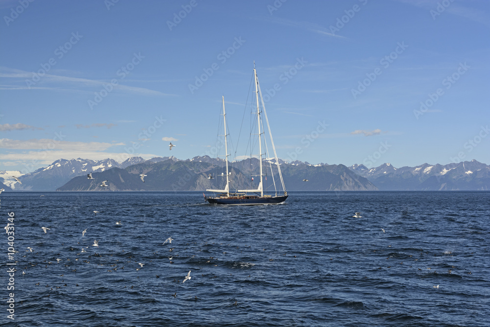Obraz premium Luxury Yacht Heading out to Sea