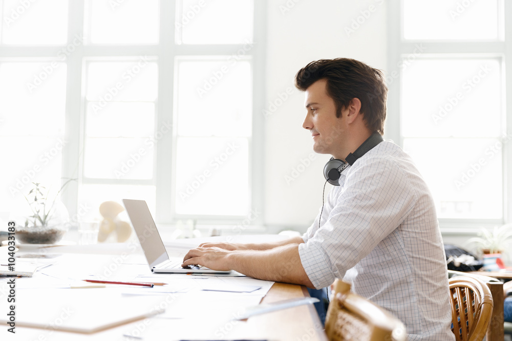 Fototapeta premium Young businessman in office