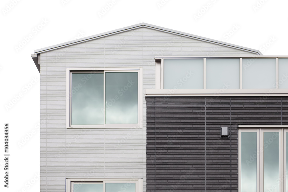 Detail of house exterior wall and window.