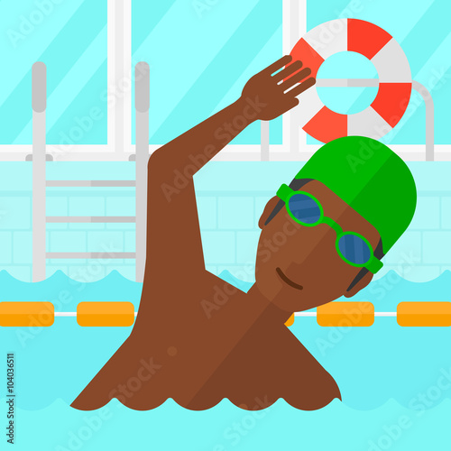 Swimmer training in pool.