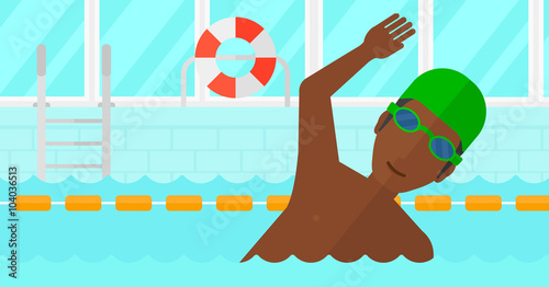 Swimmer training in pool.