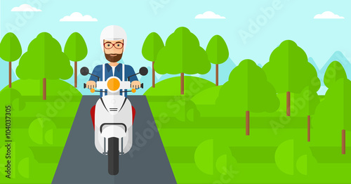 Man riding scooter.