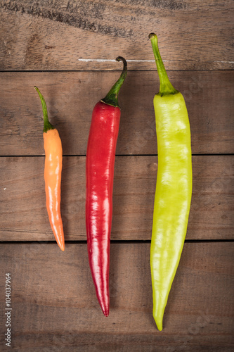 chilli on wood background